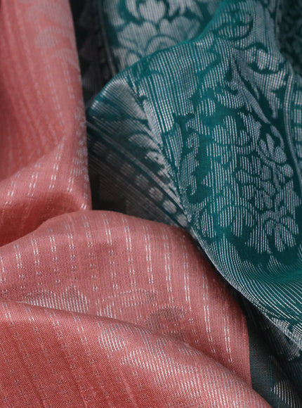 Pure raw silk saree pastel peach and green with allover silver zari weaves & buttas and silver zari woven border