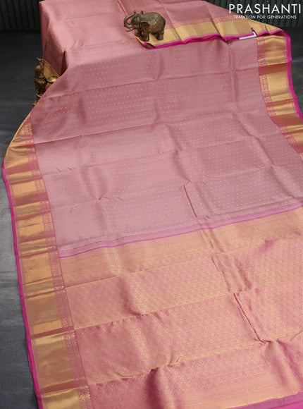 Pure kanchipuram silk saree pastel brown and pink with allover zari woven butta weaves and zari woven border