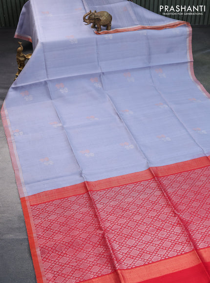 Pure raw silk saree pastel grey shade and dual shade of red with silver & copper zari woven buttas and zari woven border