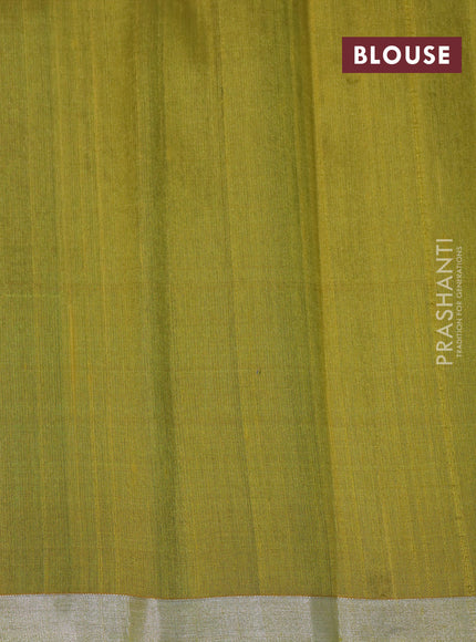 Pure raw silk saree green and mustard yellow with plain body and silver zari woven border