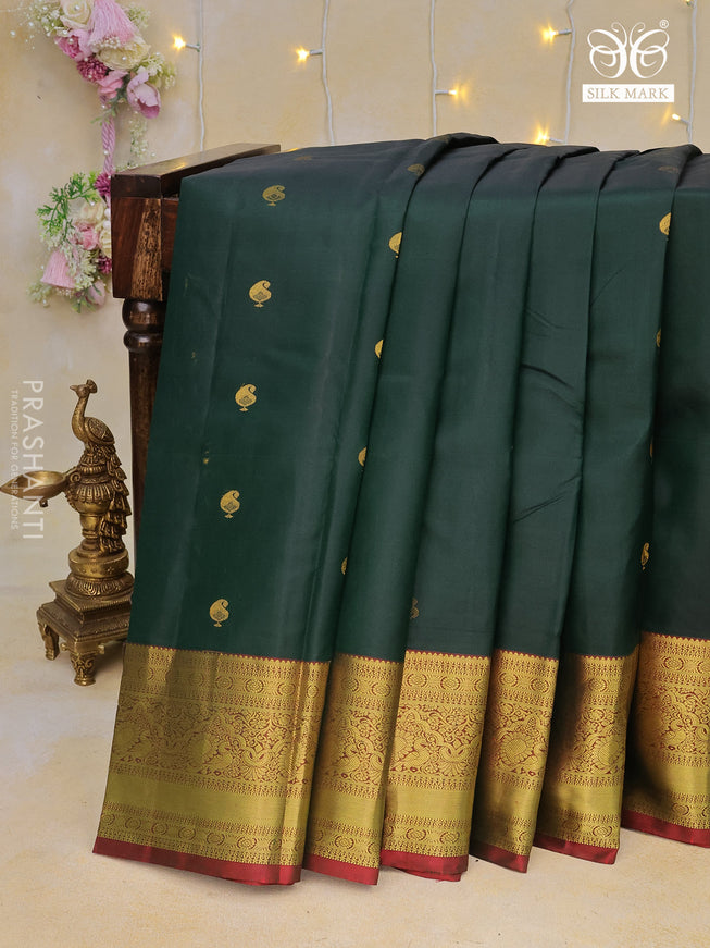 Pure kanchipuram silk saree bottle green and red with paisley zari woven buttas and zari woven border