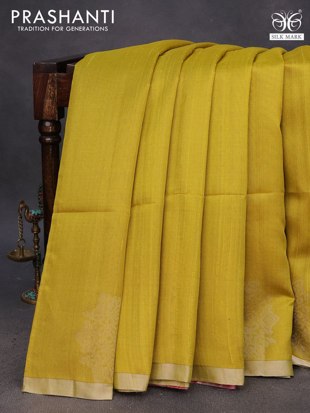 Pure raw silk saree lime yellow and pink with plain body and silver zari woven border