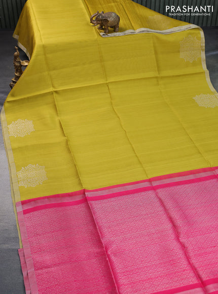 Pure raw silk saree lime yellow and pink with plain body and silver zari woven border