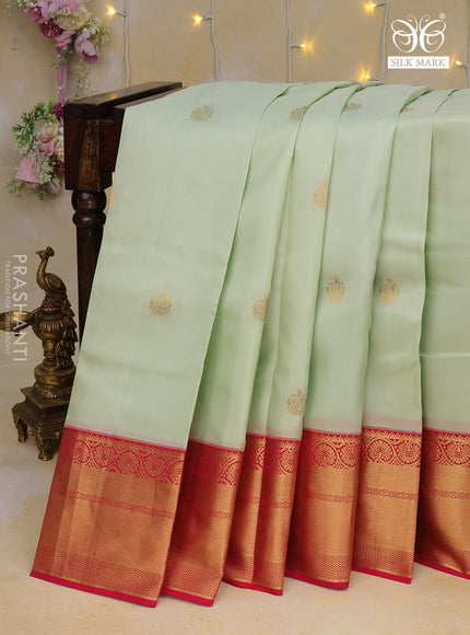 Pure kanchipuram silk saree pista green and pink with zari woven buttas and zari woven border