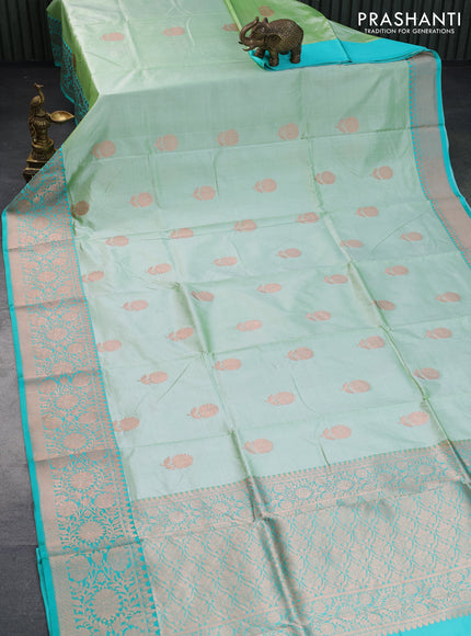 Banarasi katan silk saree pista green and teal green with copper zari woven floral buttas and zari woven border