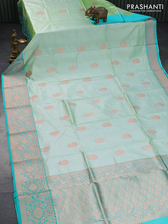 Banarasi katan silk saree pista green and teal green with copper zari woven floral buttas and zari woven border