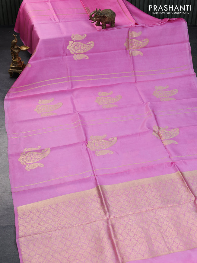 Banarasi katan silk saree light pink with zari woven paisley buttas in borderless style