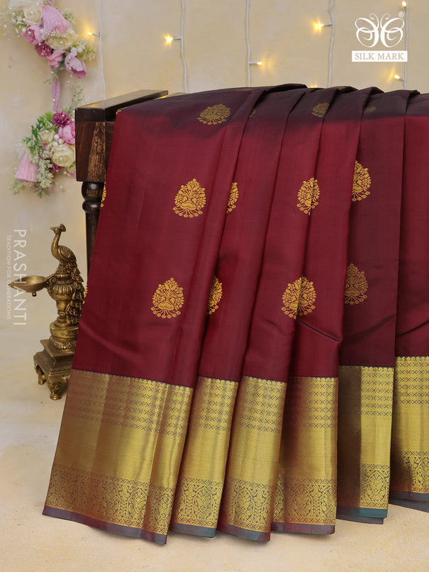 Pure kanchipuram silk saree deep maroon and dual shade of teal green with zari woven buttas and zari woven border