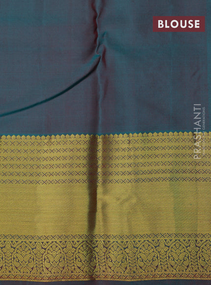 Pure kanchipuram silk saree deep maroon and dual shade of teal green with zari woven buttas and zari woven border