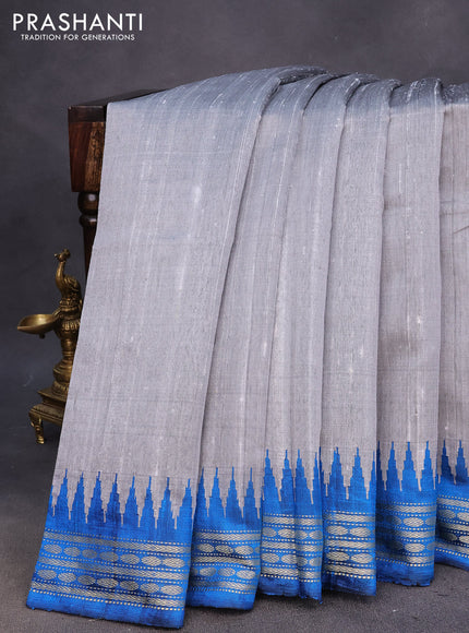 Pure dupion silk saree pastel grey and cs blue with plain body and ikat woven pallu