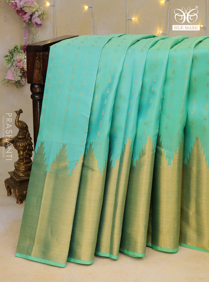 Pure kanchipuram silk saree teal blue with zari woven buttas and temple design zari woven border