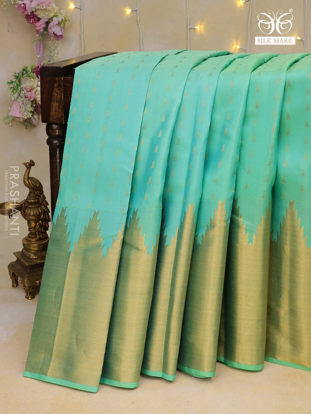 Pure kanchipuram silk saree teal blue with zari woven buttas and temple design zari woven border