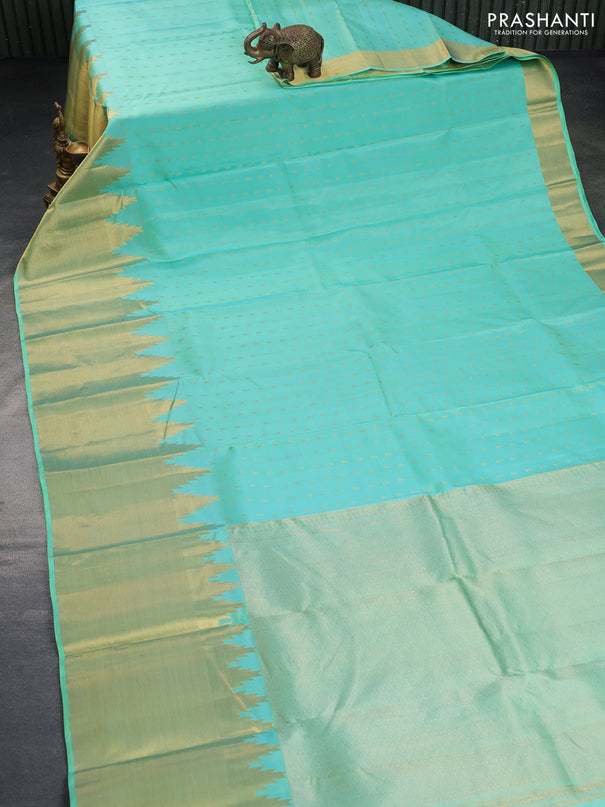 Pure kanchipuram silk saree teal blue with zari woven buttas and temple design zari woven border