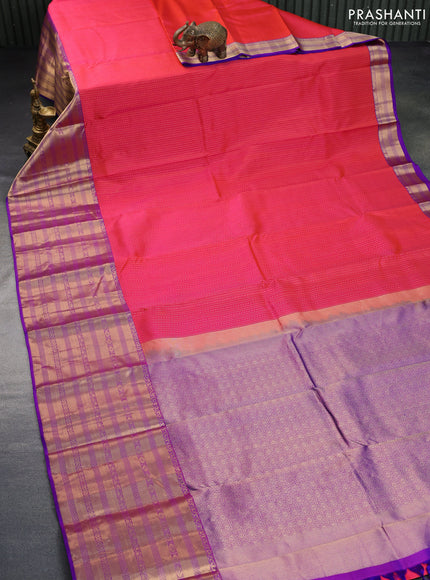 Pure kanchipuram silk saree dual shade of pinkish orange and purple with allover zari weaves and long zari woven border