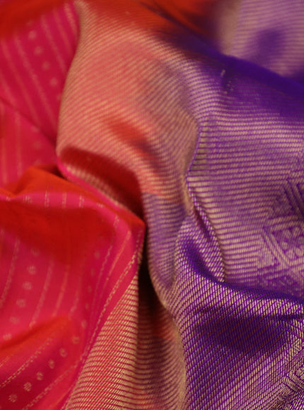 Pure kanchipuram silk saree dual shade of pinkish orange and purple with allover zari weaves and long zari woven border