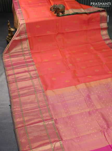 Pure kanchipuram silk saree dual shade of pinkish orange and green with zari woven buttas and long annam zari woven border