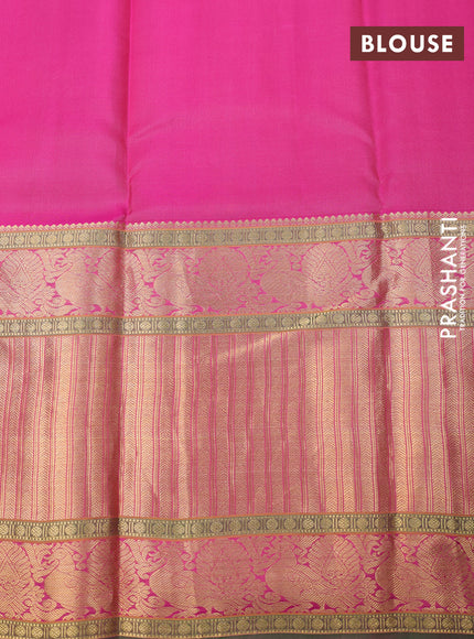 Pure kanchipuram silk saree dual shade of pinkish orange and green with zari woven buttas and long annam zari woven border