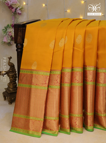 Pure kanchipuram silk saree mustard yellow and green with zari woven buttas and long annam zari woven border