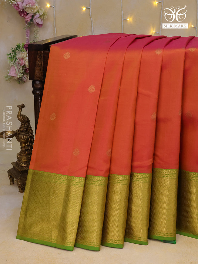 Pure kanchipuram silk saree dual shade of pinkish yellow and green with zari woven buttas and long zari woven border