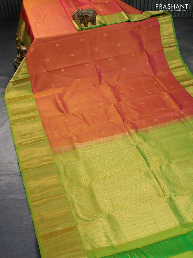 Pure kanchipuram silk saree dual shade of pinkish yellow and green with zari woven buttas and long zari woven border