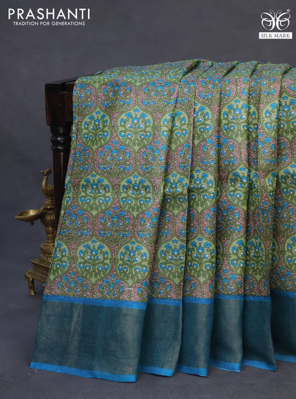 Pure tussar silk saree sap green and cs blue with allover prints and zari woven border