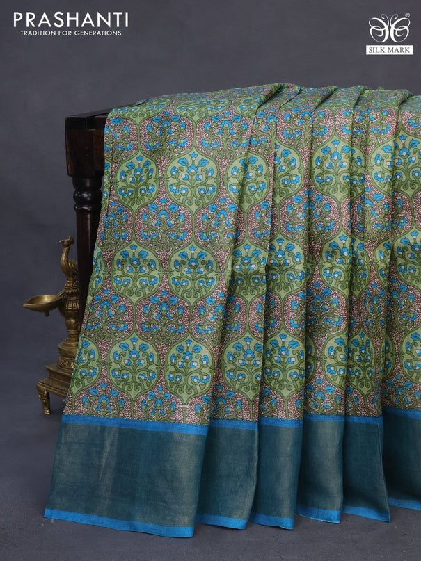 Pure tussar silk saree sap green and cs blue with allover prints and zari woven border