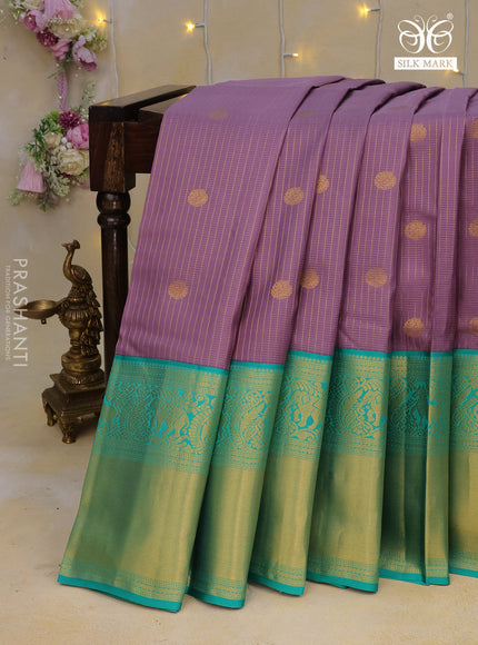 Pure kanchipuram silk saree pastel purple and teal green shade with allover zari checks & buttas and long rich zari woven korvai border