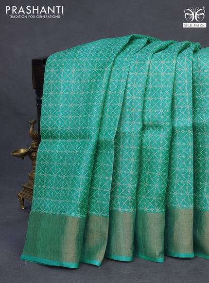 Pure tussar silk saree teal blue with allover geometric prints and zari woven border