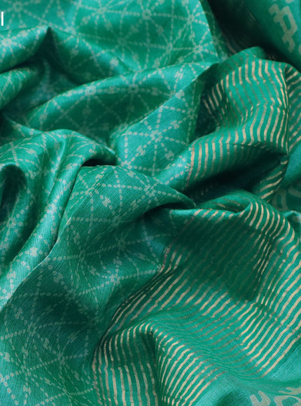 Pure tussar silk saree teal blue with allover geometric prints and zari woven border