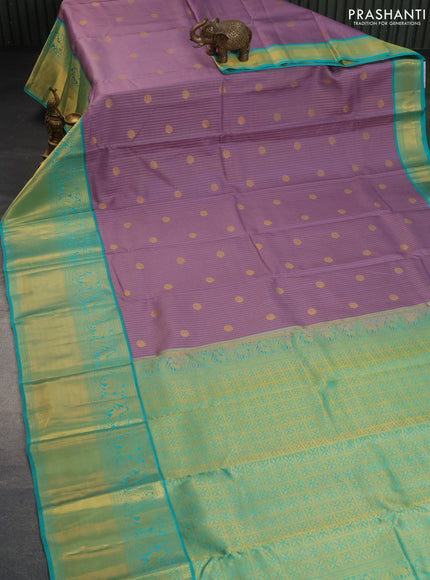 Pure kanchipuram silk saree pastel purple and teal green shade with allover zari checks & buttas and long rich zari woven korvai border