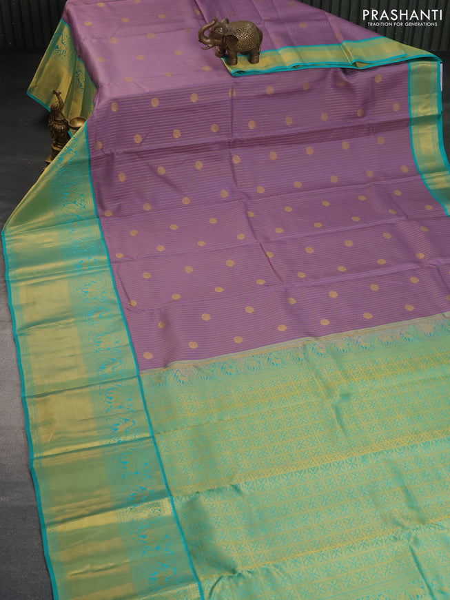 Pure kanchipuram silk saree pastel purple and teal green shade with allover zari checks & buttas and long rich zari woven korvai border