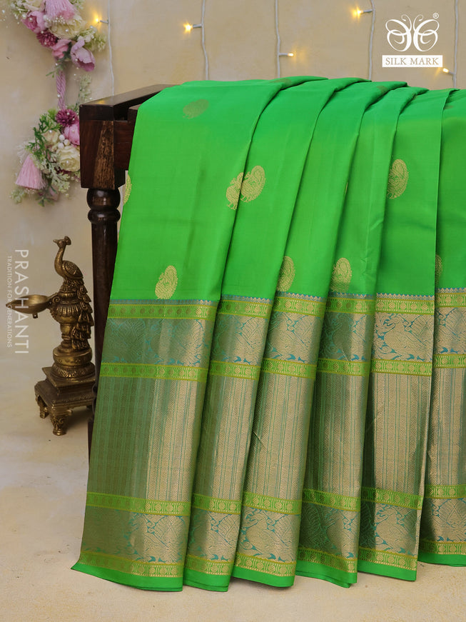 Pure kanchipuram silk saree parrot green and dual shade of cs blue with zari woven annam buttas and long annam zari woven border