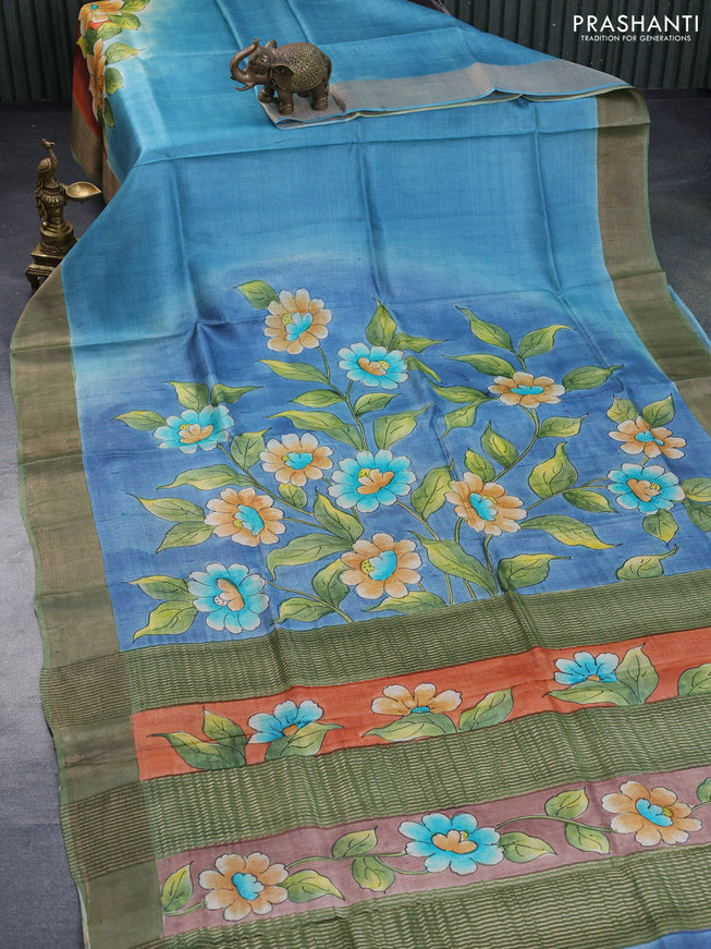 Pure tussar silk saree blue shade and green with floral hand painted prints and zari woven border