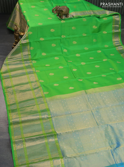 Pure kanchipuram silk saree parrot green and dual shade of cs blue with zari woven annam buttas and long annam zari woven border