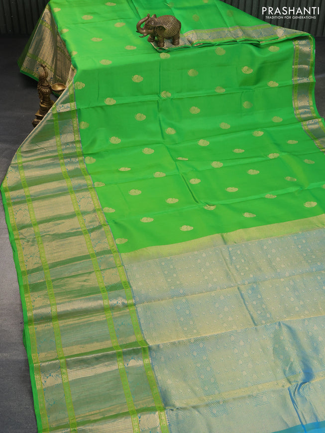 Pure kanchipuram silk saree parrot green and dual shade of cs blue with zari woven annam buttas and long annam zari woven border