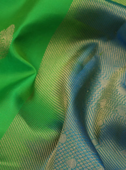 Pure kanchipuram silk saree parrot green and dual shade of cs blue with zari woven annam buttas and long annam zari woven border