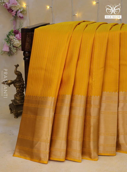 Pure kanchipuram silk saree yellow with allover zari weaves and long zari woven border