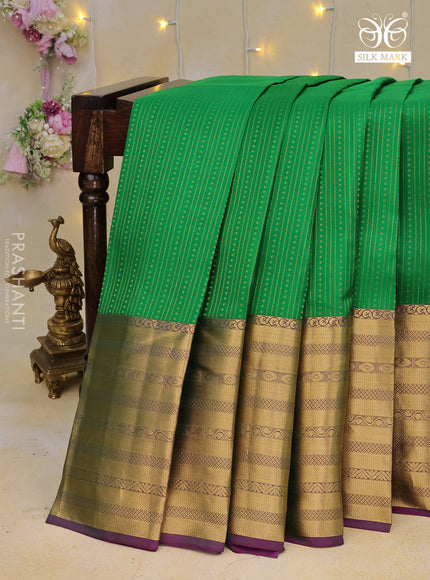 Pure kanchipuram silk saree green and dual shade of purple with allover zari weaves and long zari woven border