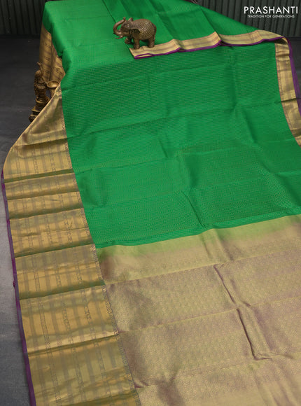 Pure kanchipuram silk saree green and dual shade of purple with allover zari weaves and long zari woven border