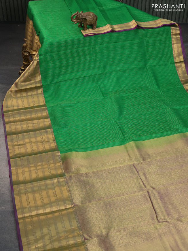 Pure kanchipuram silk saree green and dual shade of purple with allover zari weaves and long zari woven border