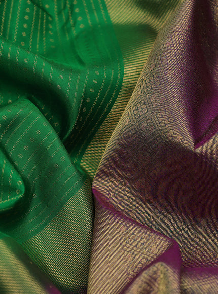 Pure kanchipuram silk saree green and dual shade of purple with allover zari weaves and long zari woven border