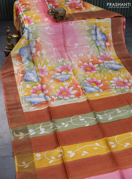 Pure tussar silk saree multi colour and rustic orange with floral hand painted prints and zari woven border