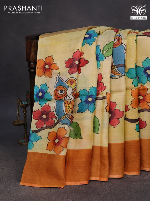 Pure tussar silk saree pale yellow and orange with floral hand painted prints and zari woven border