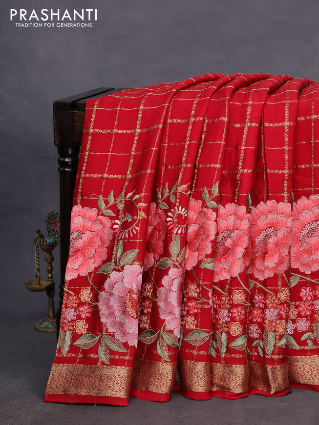 Pure crepe saree red with allover zari checks & floral deisgn embroidery work and zari woven border