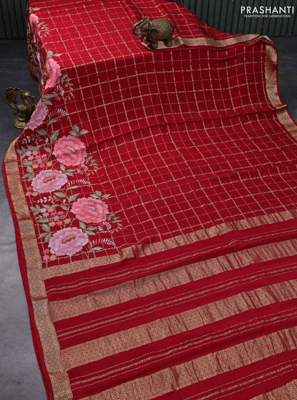 Pure crepe saree red with allover zari checks & floral deisgn embroidery work and zari woven border