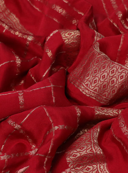 Pure crepe saree red with allover zari checks & floral deisgn embroidery work and zari woven border