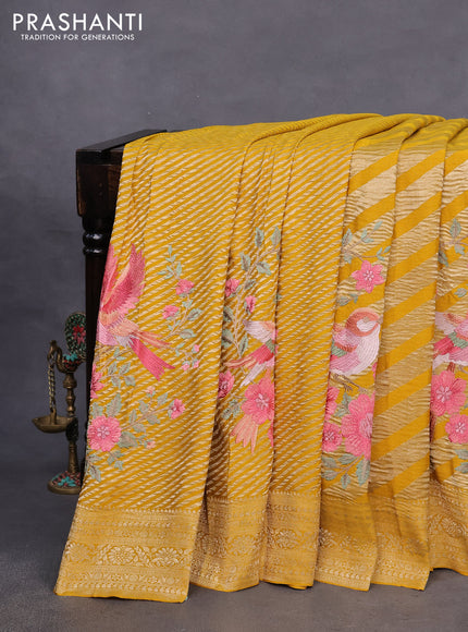 Pure crepe saree mustard yellow with allover zari woven leheriya weaves & embroidery work and zari woven border