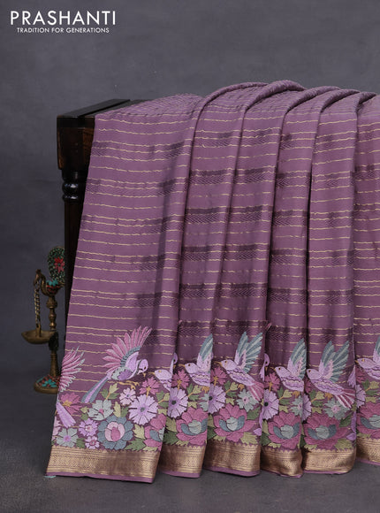 Pure crepe saree pastel lavender with allover zari weaves & embroidery work and zari woven border