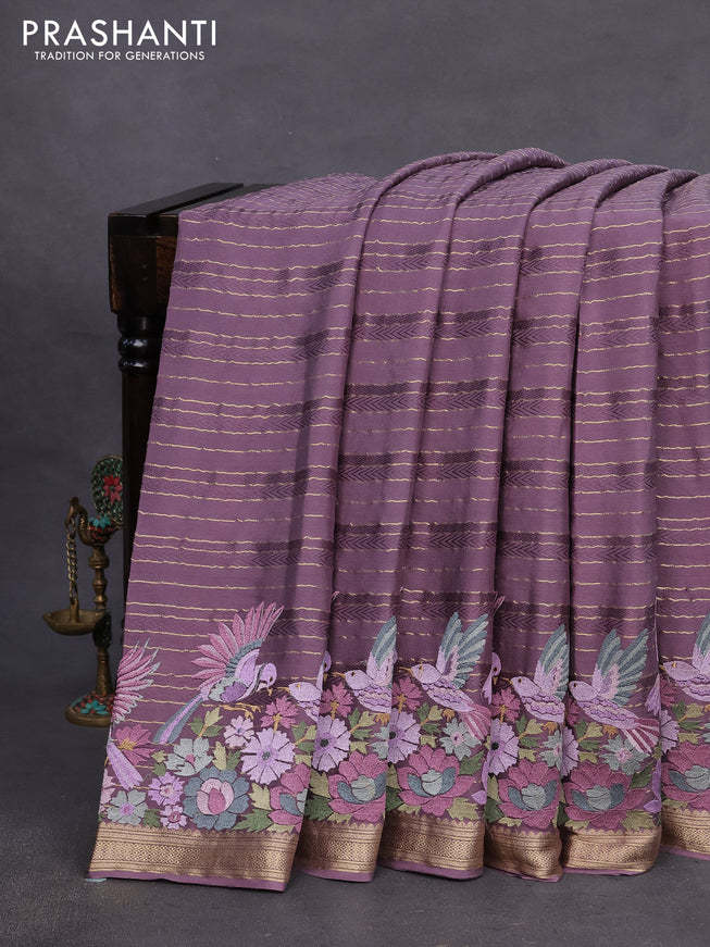 Pure crepe saree pastel lavender with allover zari weaves & embroidery work and zari woven border