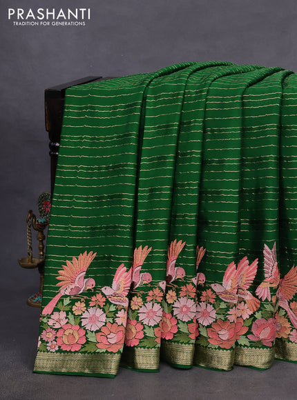 Pure crepe saree green with allover zari weaves & embroidery work and zari woven border